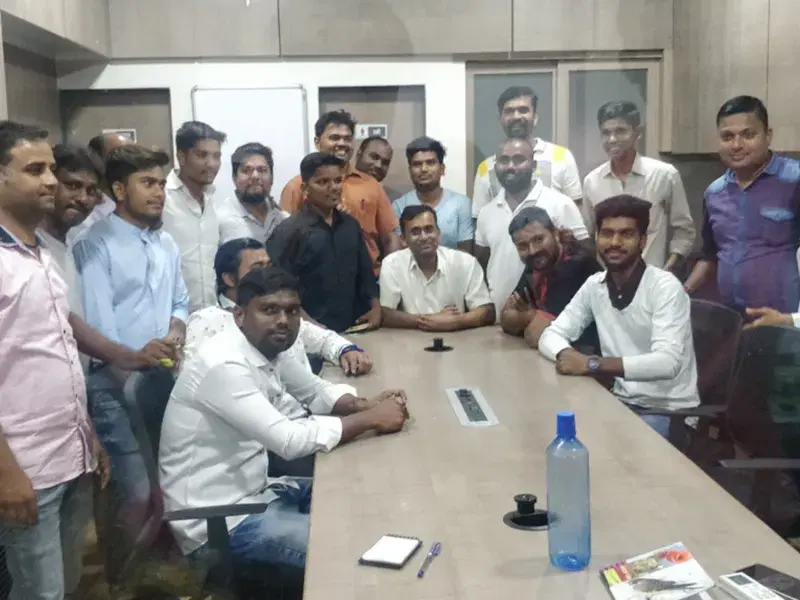 An Everest Fleet city team around a meeting table